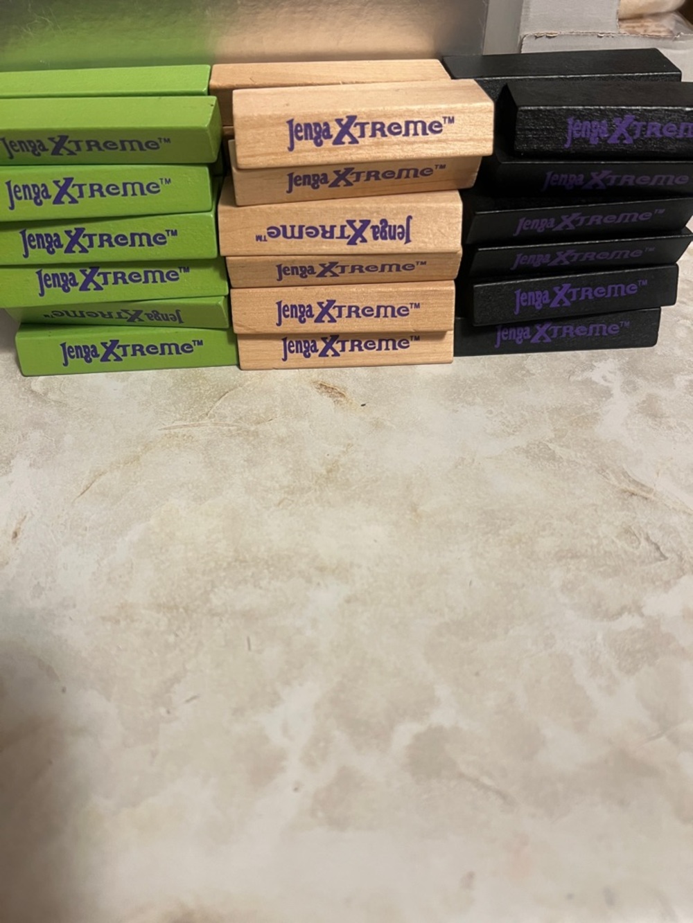 Jenga Xtreme Wooden Block Stacking Game Set - Green, Natural & Black
No case
